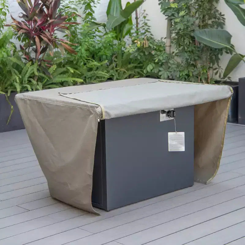 Housse rectangulaire pour brasero de table, imperméable et résistante aux UV, adaptée aux terrasses, balcons ou porches extérieurs.