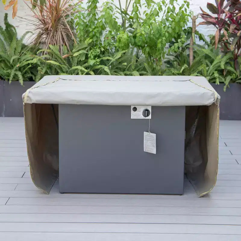 Housse rectangulaire pour brasero de table, imperméable et résistante aux UV, adaptée aux terrasses, balcons ou porches extérieurs.
