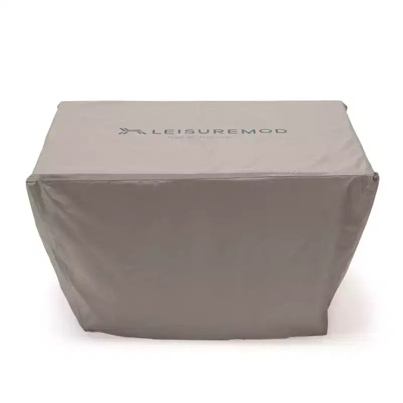 Housse rectangulaire pour brasero de table, imperméable et résistante aux UV, adaptée aux terrasses, balcons ou porches extérieurs.