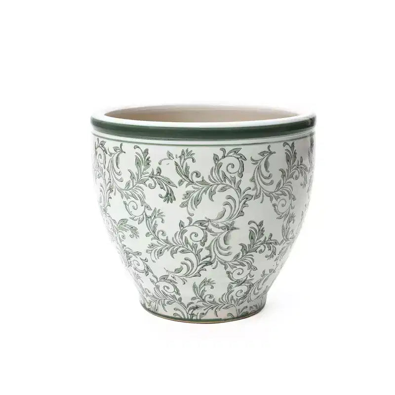 Pot de fleurs en céramique vert à motifs, rond, adapté à une utilisation intérieure et extérieure.