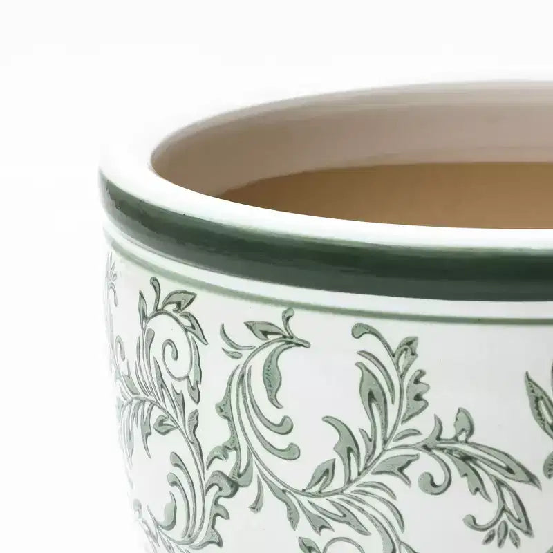 Pot de fleurs en céramique vert à motifs, rond, adapté à une utilisation intérieure et extérieure.